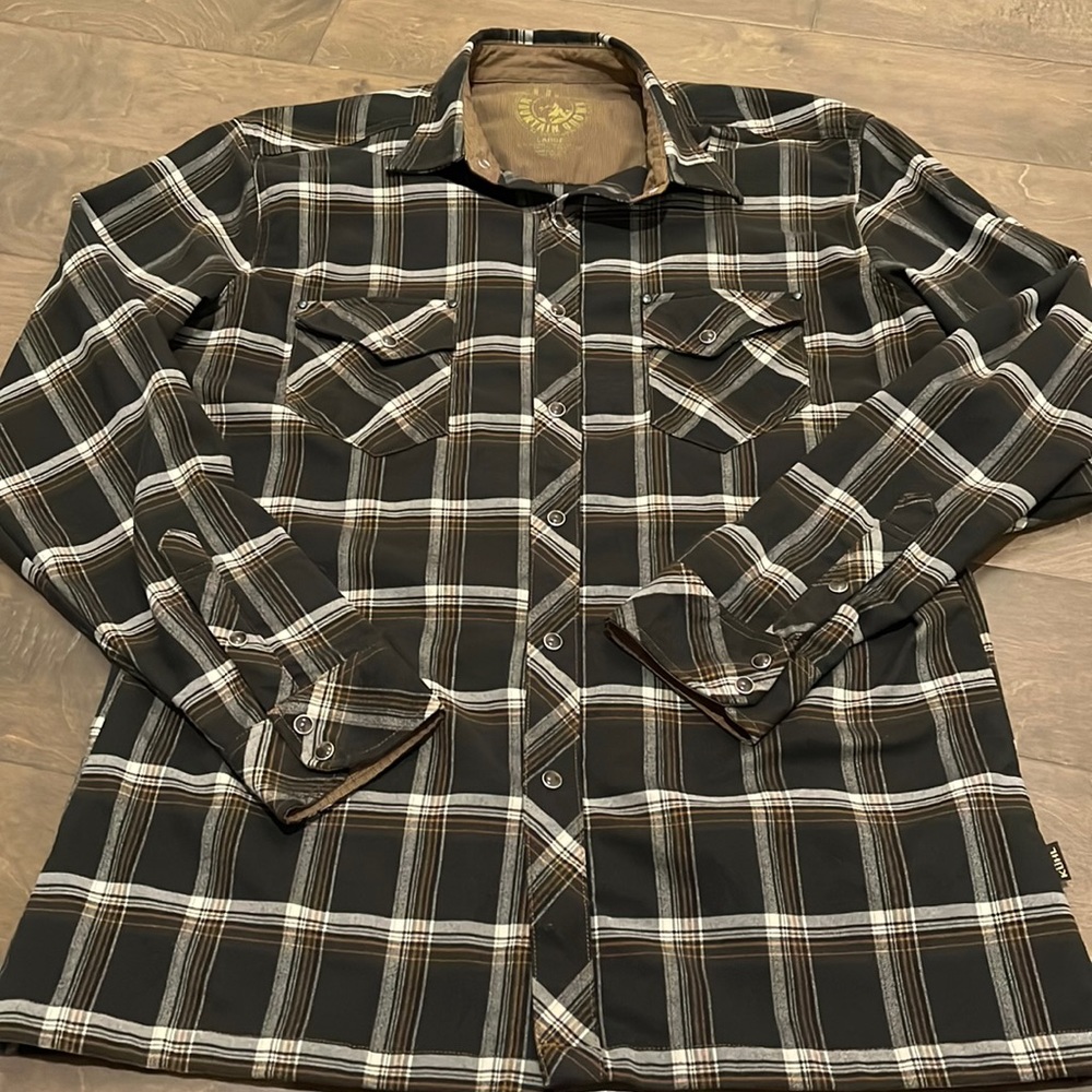 Mens Kuhl brand flannel plaid size large with snaps. EUC